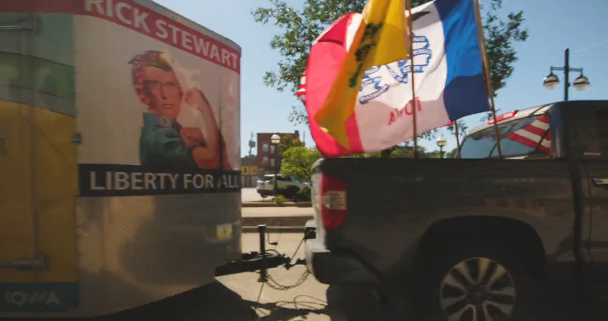 Rick Stewart Liberty for all! Iowa Gubernatorial Campaigntruck and Iowa US flag with trailer- front passenger side view. Fall 2022
